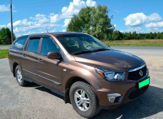 Образец цвета OAQ CANYON BROWN на автомобиле - №1