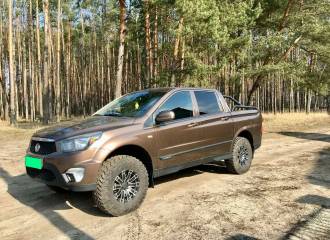 Образец цвета OAQ CANYON BROWN на автомобиле - №2