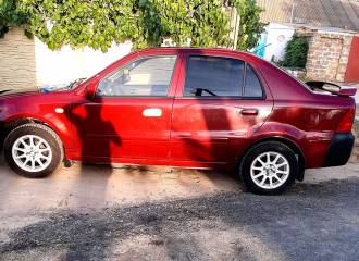 Образец цвета 054 GUAVA RED на автомобиле - №1