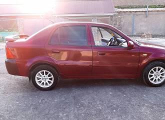 Образец цвета 054 GUAVA RED на автомобиле - №2