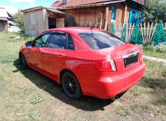 Образец цвета 33J GARNET RED на автомобиле - №3