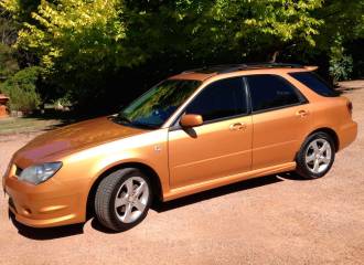 Образец цвета 56M SUNSET ORANGE на автомобиле - №1