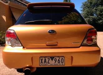 Образец цвета 56M SUNSET ORANGE на автомобиле - №2