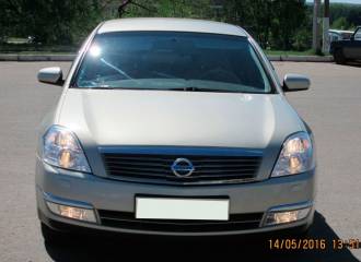 Образец цвета K32 YELLOWISH SILVER на автомобиле - №3