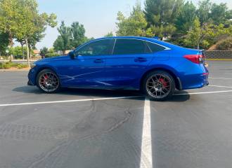 Образец цвета B593M NEW SPORTY BLUE на автомобиле - №3