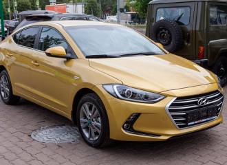 Образец цвета WY7 BLAZING YELLOW на автомобиле - №1