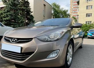 Образец цвета P2N BRONZE на автомобиле - №1