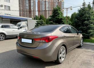 Образец цвета P2N BRONZE на автомобиле - №3