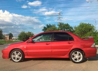 Образец цвета CF RIO RED на автомобиле - №2